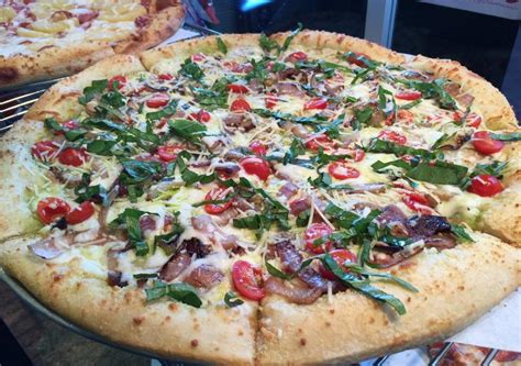 Pizza schmizza - Schmizza Pub & Grub - 8695 SW Jack Burns Blvd, #J, Wilsonville OR 97070.